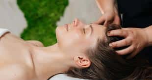 Photo of a lady having an Indian head massage